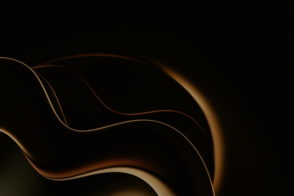 a black and brown abstract background with wavy lines