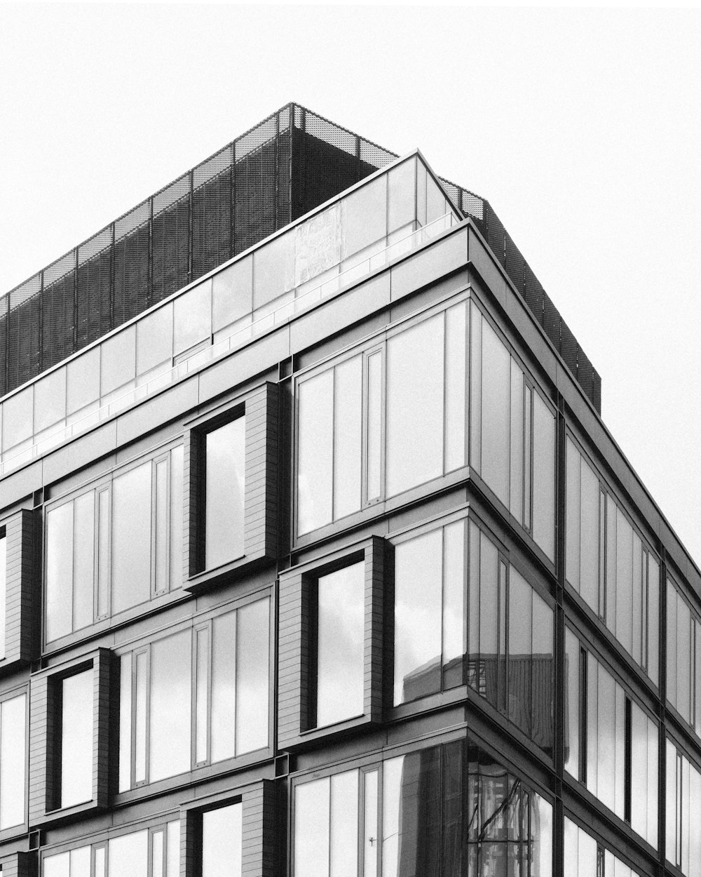 a black and white photo of a tall building