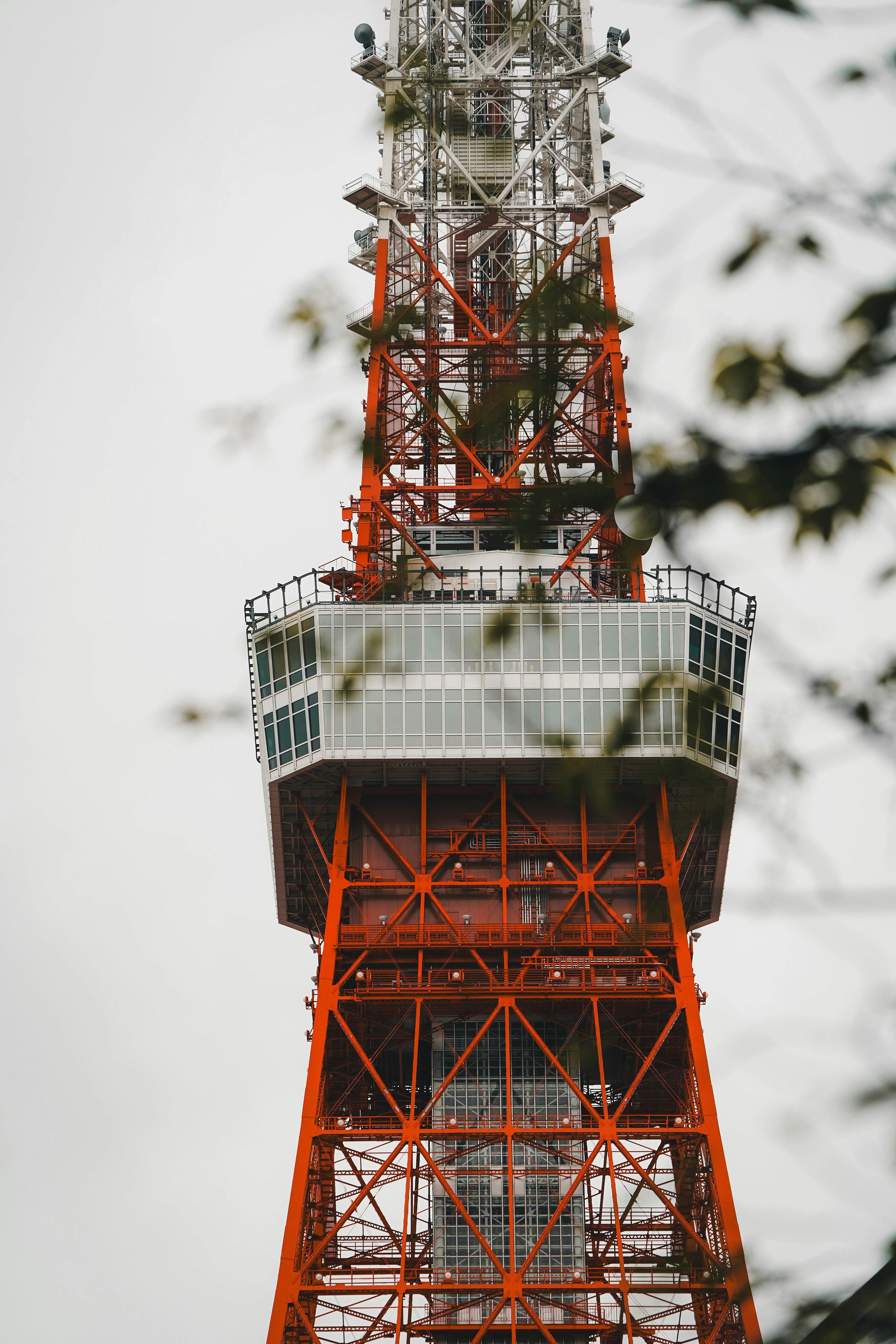 a very tall tower with a clock on it's side