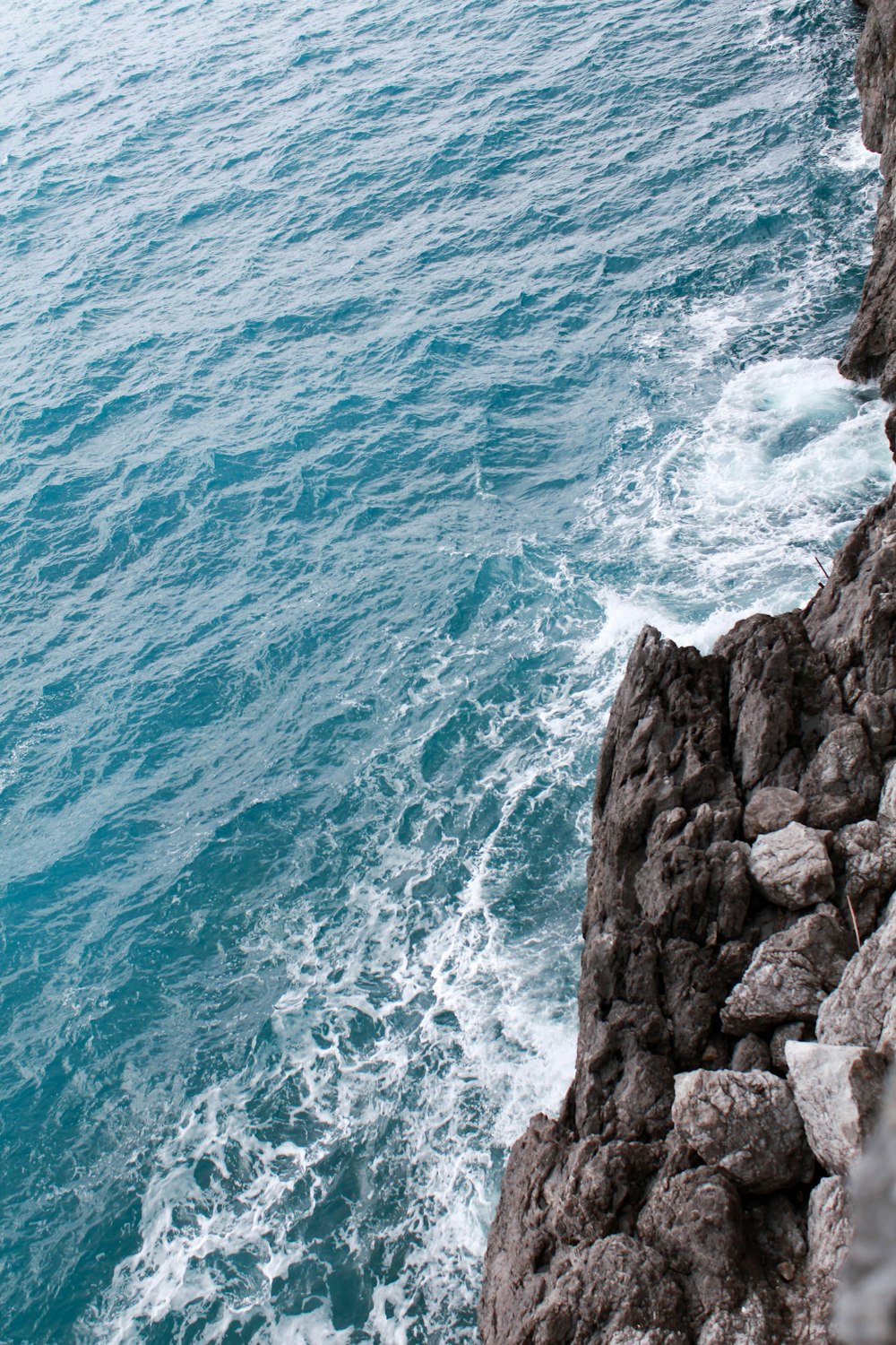 a view of the ocean from a cliff