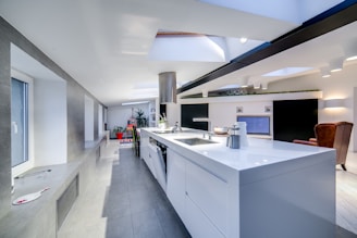 a large kitchen with a long counter top