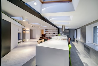 a modern kitchen with a skylight above it