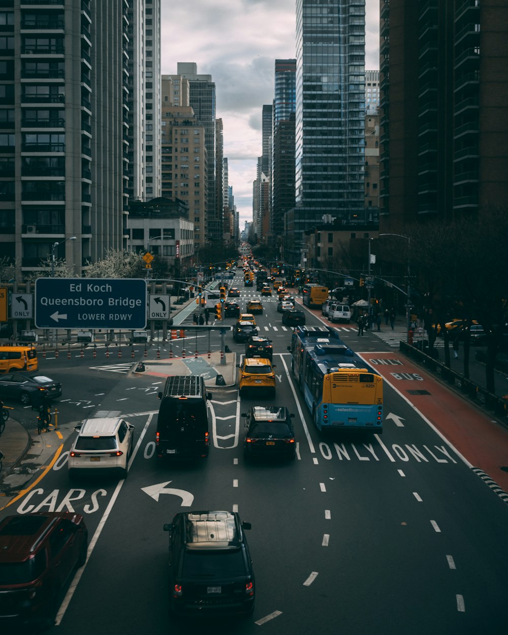 a city street filled with lots of traffic