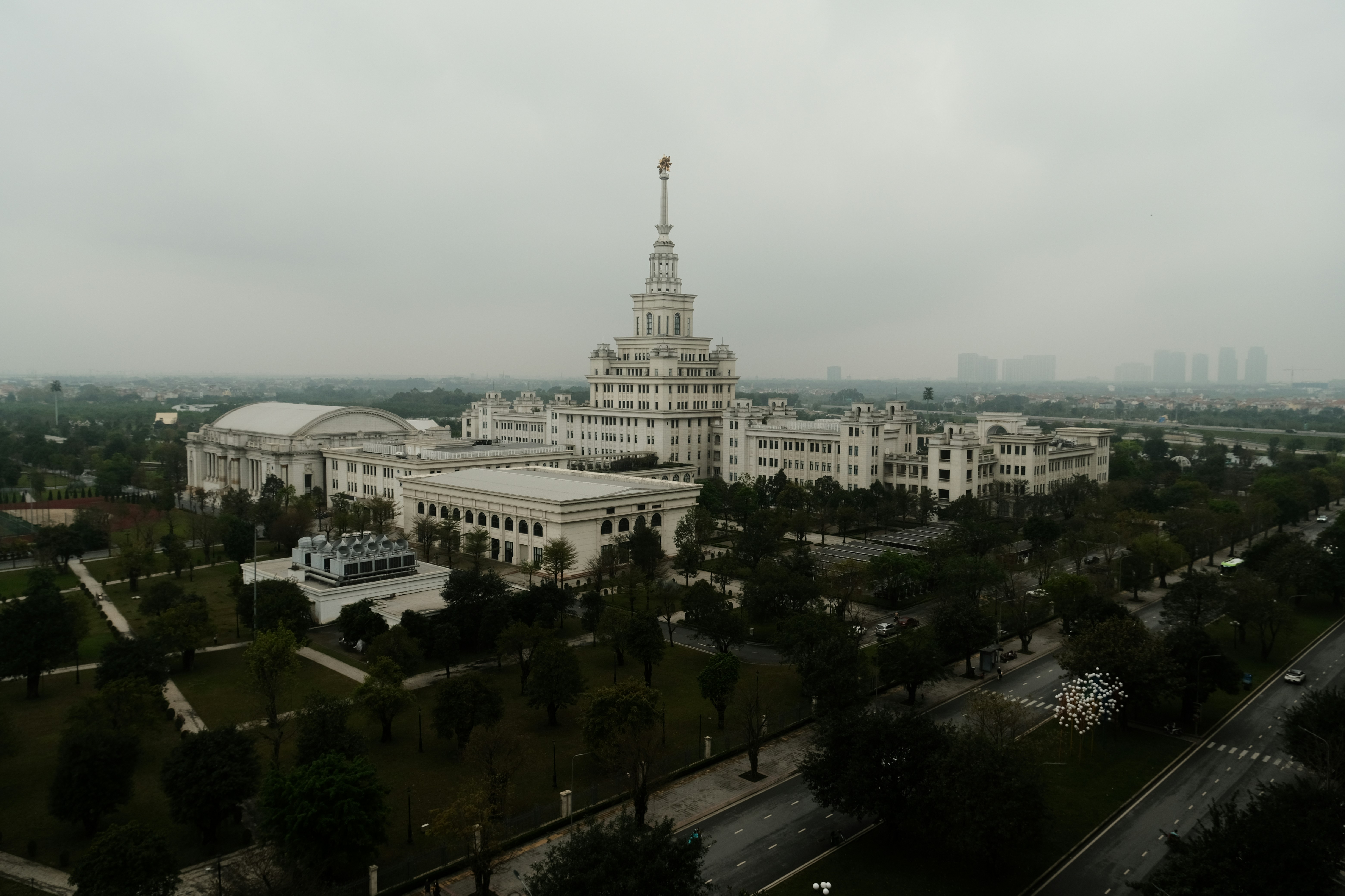 An aerial view of a large white building photo – Free Car Image on Unsplash