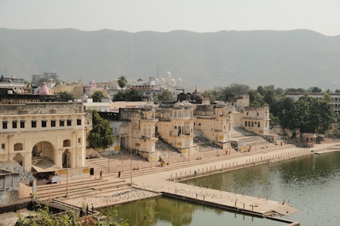 a large body of water next to a city
