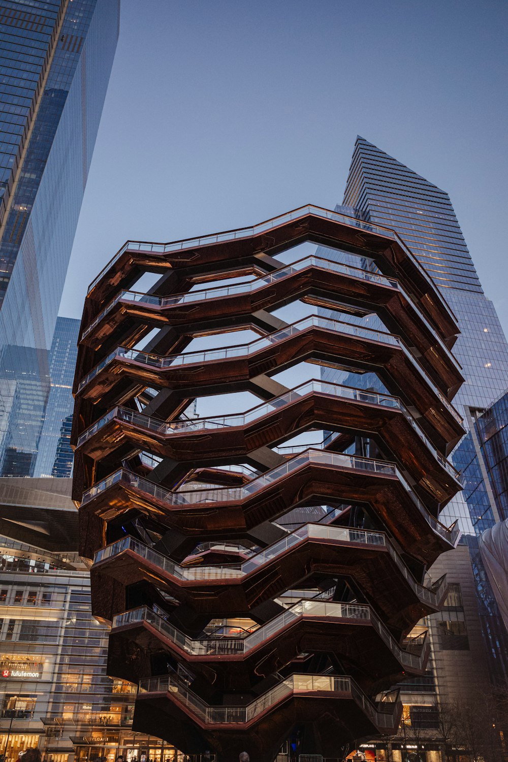 a tall building with a spiral staircase in the middle of it