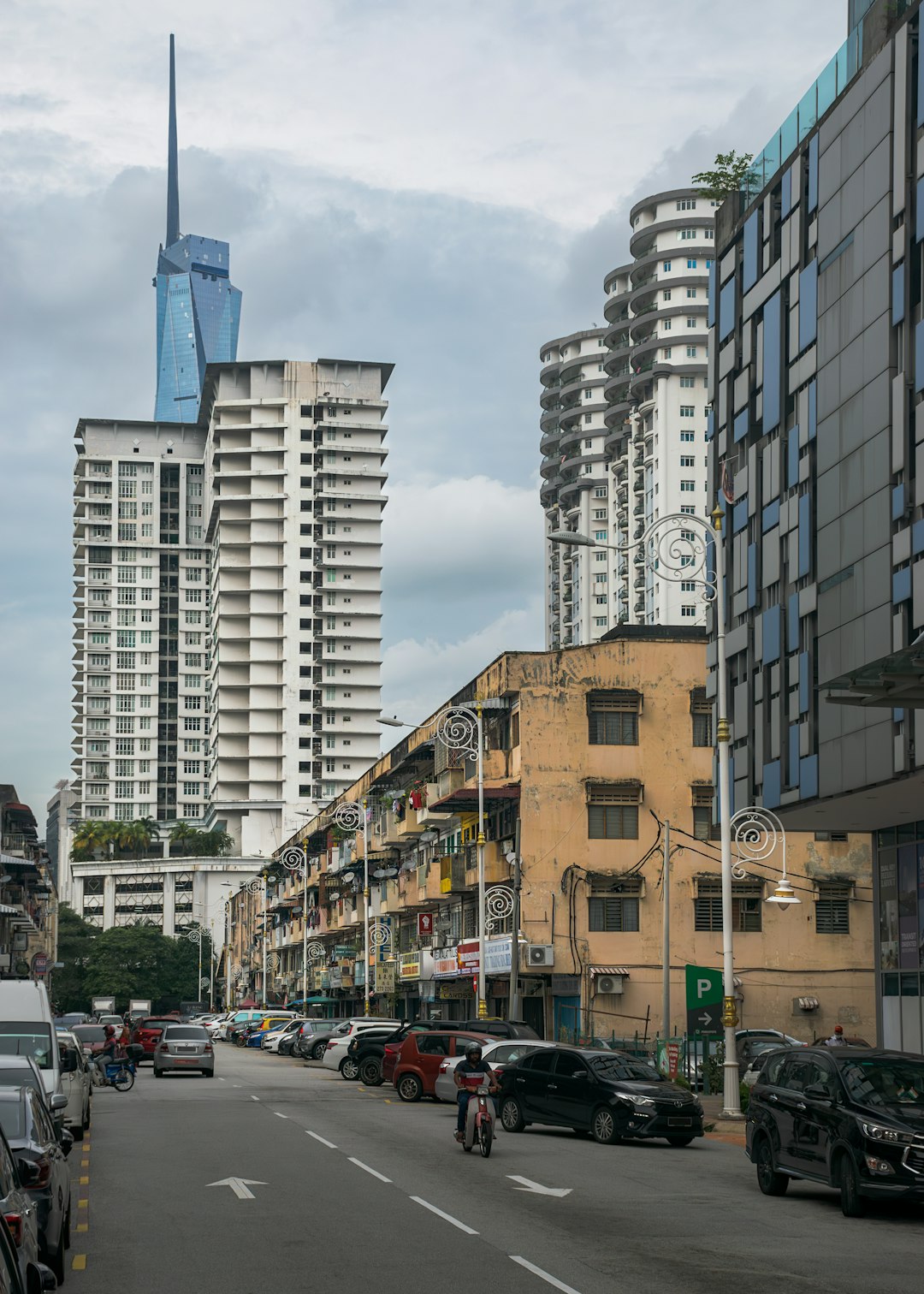 View of Brickfields neighborhood with the Merdeka tower in the background. KLCC, Kuala Lumpur, Malaysia, Apr/23.