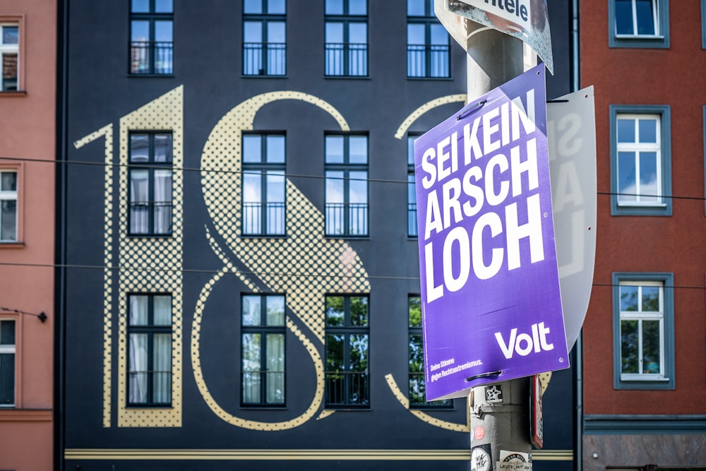 a street sign in front of a building