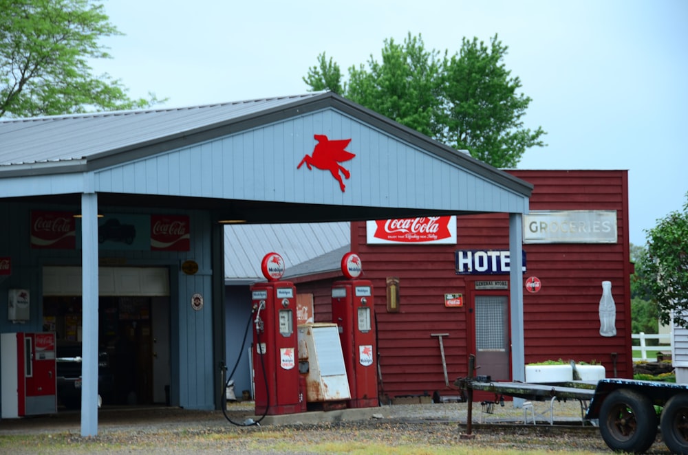 a red building with a sign on the front of it