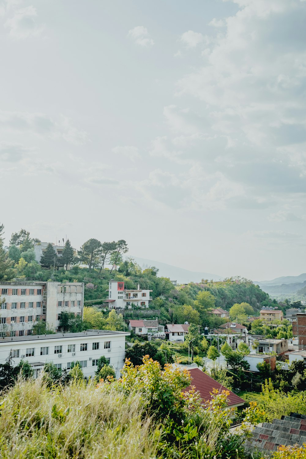 a view of a city from a hill