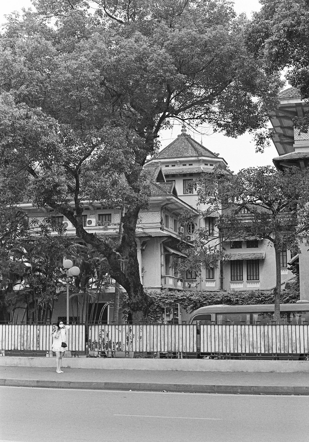 a black and white photo of a large house
