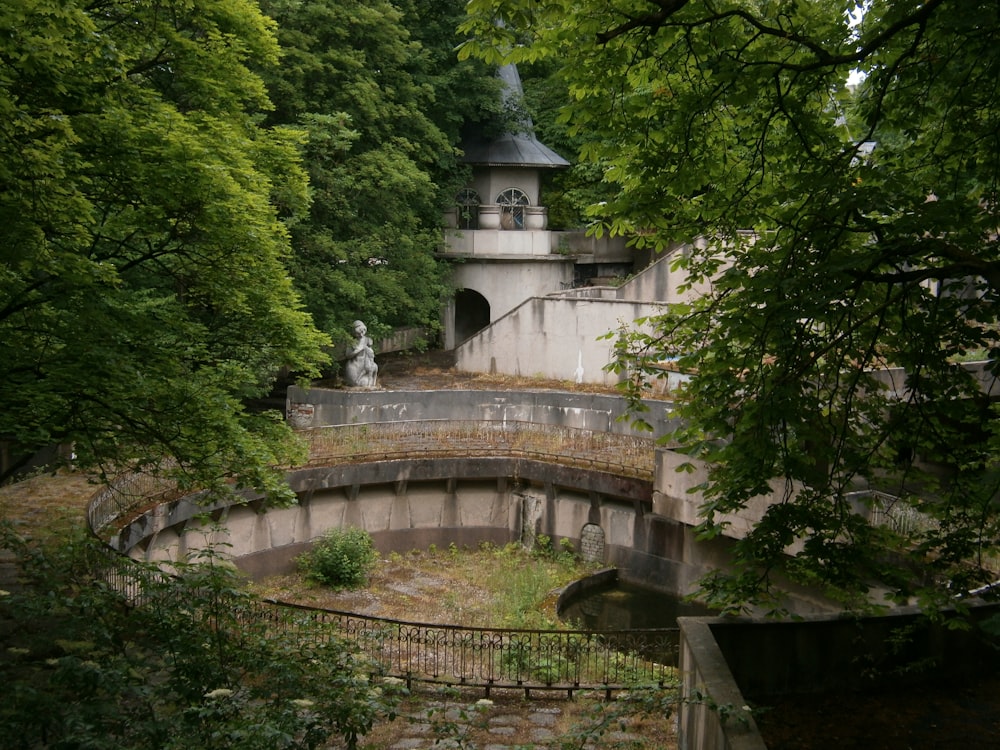 an old building in the middle of a forest