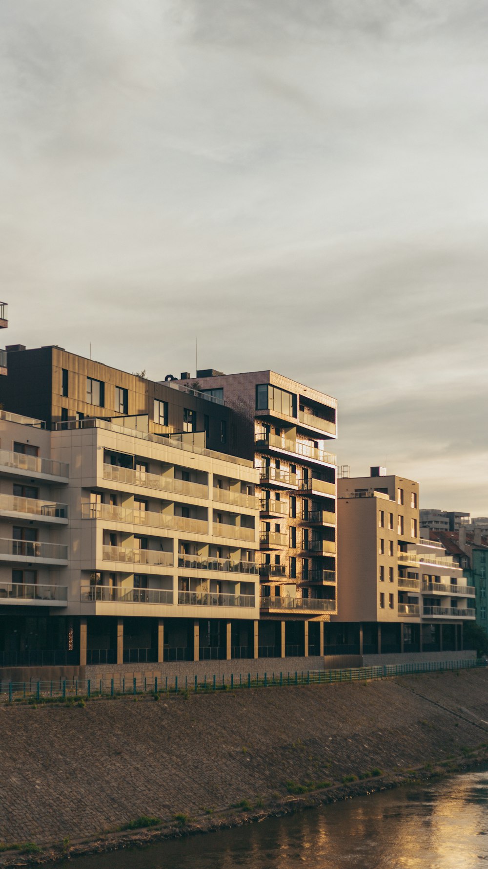 a large building next to a body of water