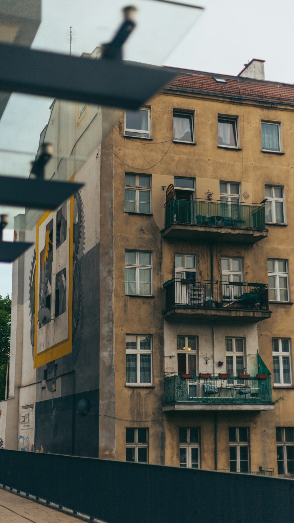 a tall building with balconies and balconies on it