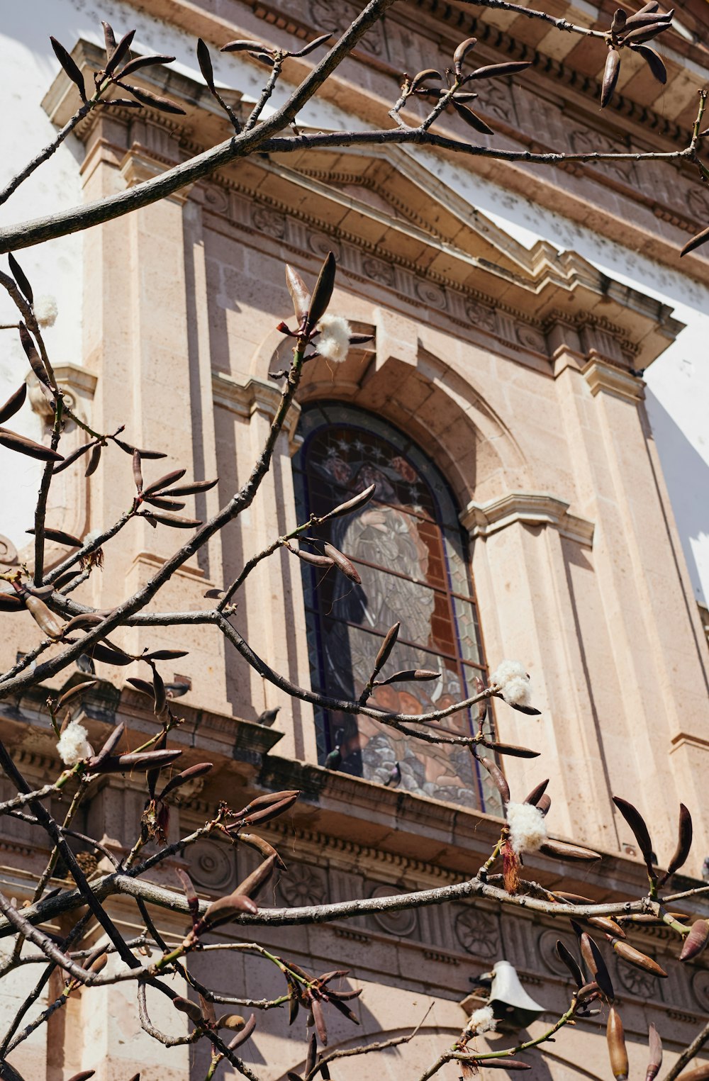 a large building with a clock on the side of it