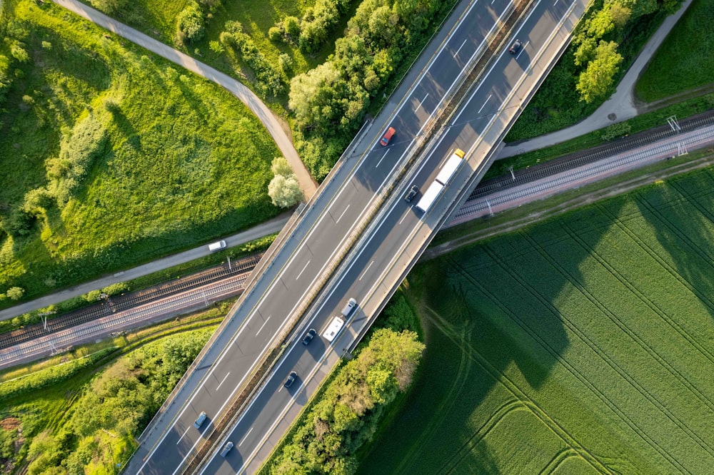 an aerial view of a highway with a truck on it