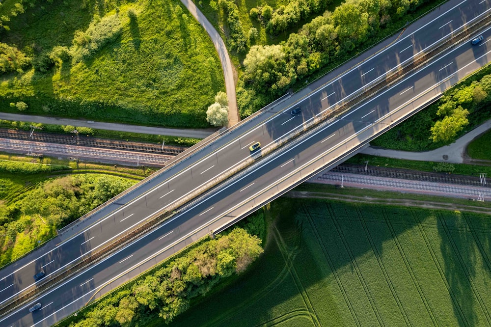 an aerial view of a highway and a bridge