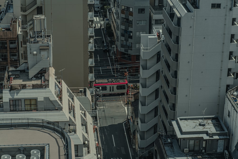 an aerial view of a city with tall buildings