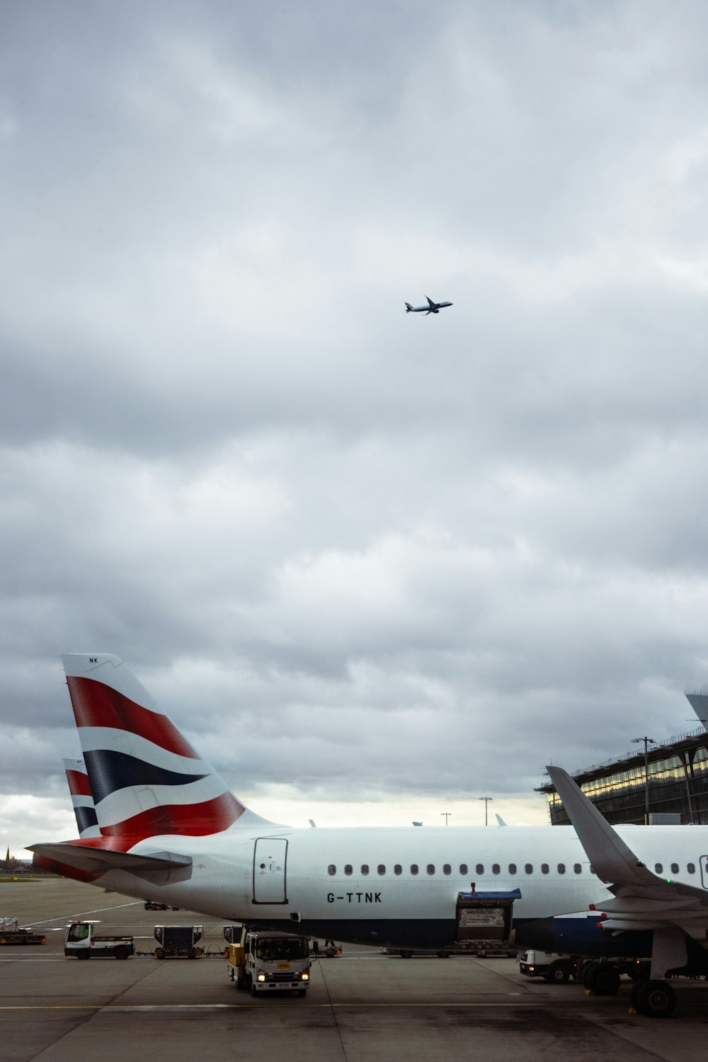 a large jetliner sitting on top of an airport tarmac