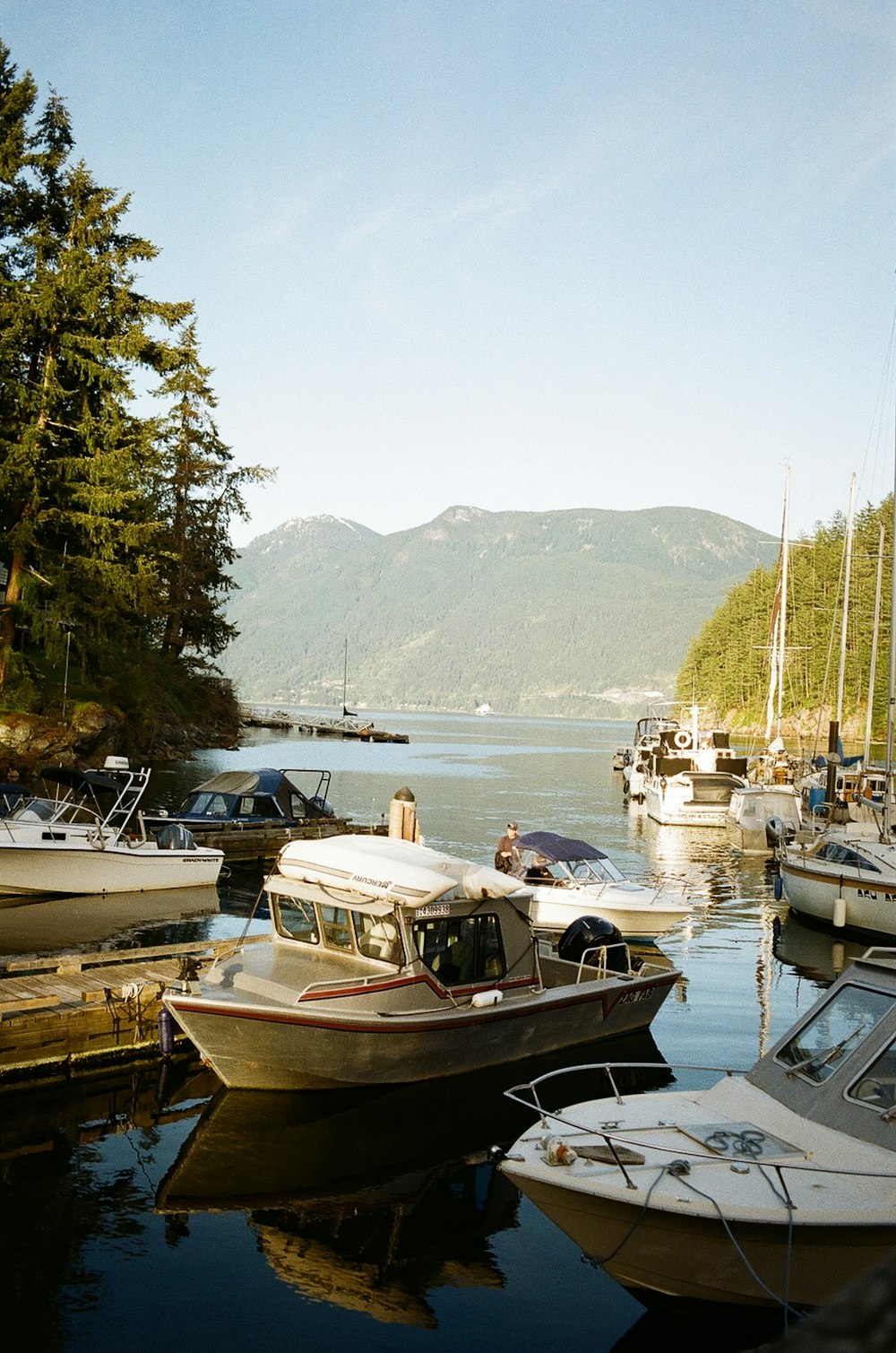 a group of boats that are sitting in the water