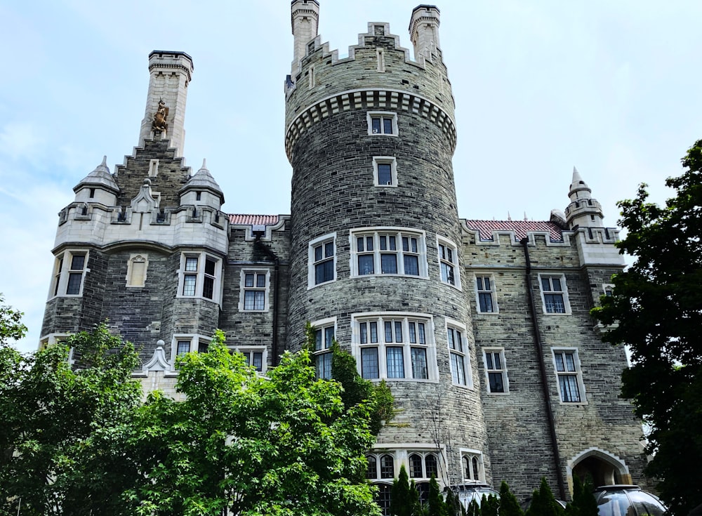 a large castle like building with a clock tower