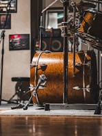 a drum set up in a recording studio