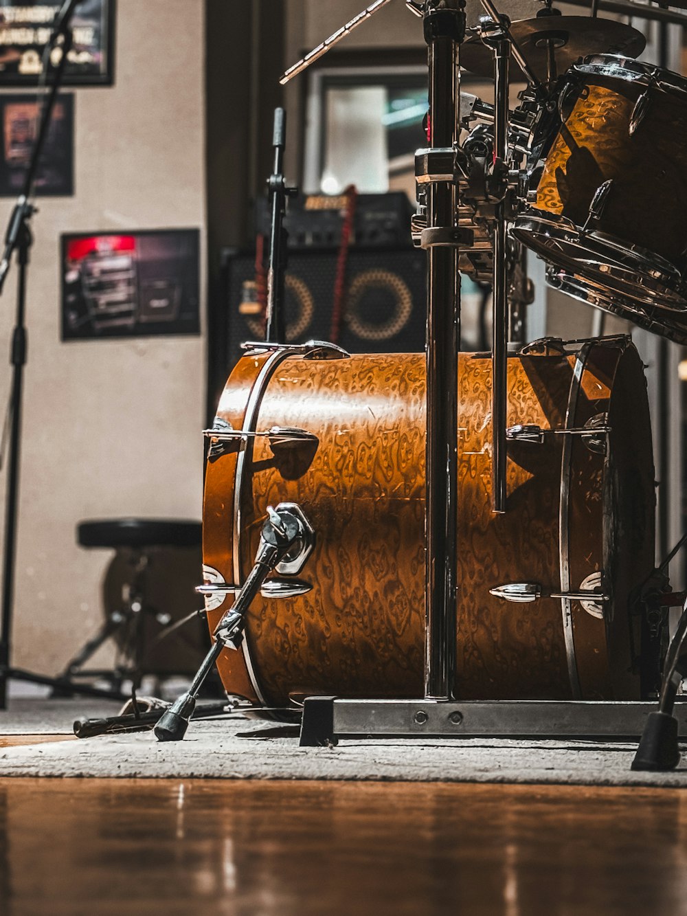 a drum set up in a recording studio