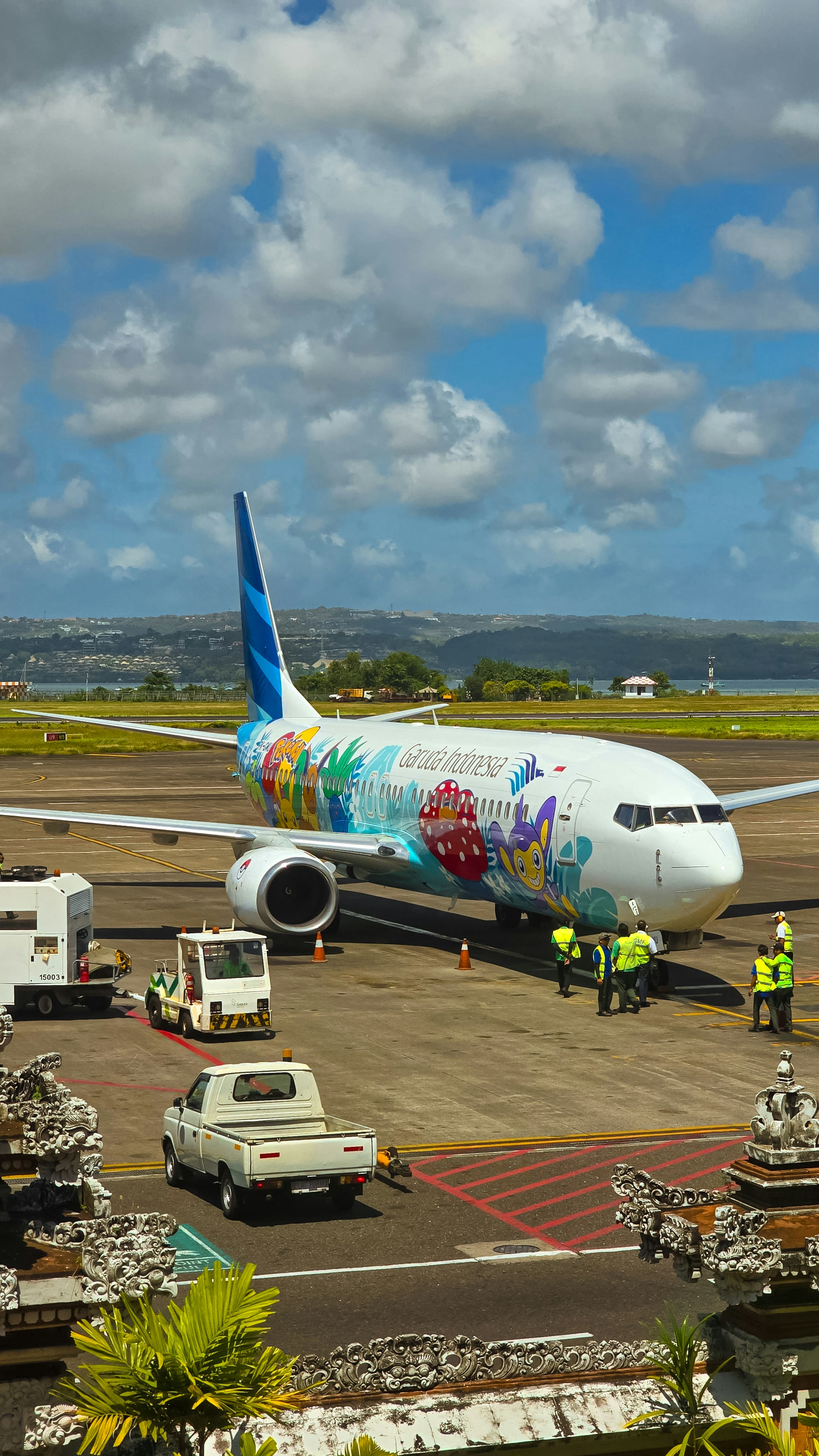 a large passenger jet sitting on top of an airport tarmac