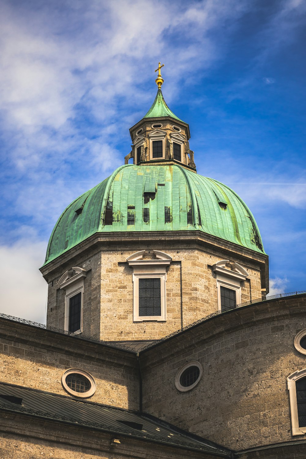 a green dome on top of a building