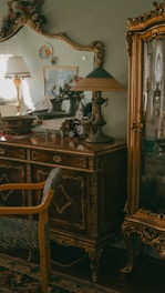 a room with a dresser and a mirror