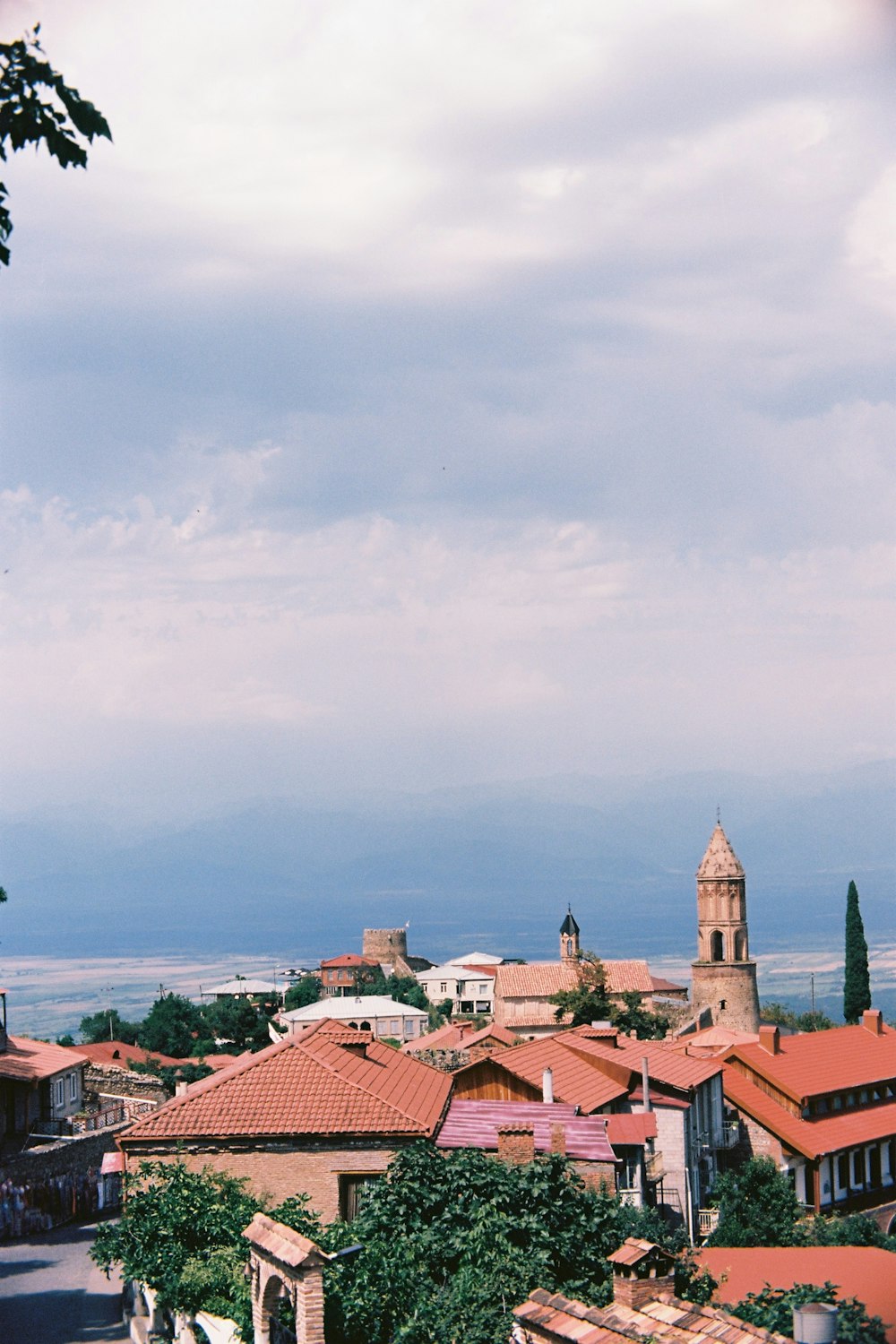 a view of a town with a clock tower