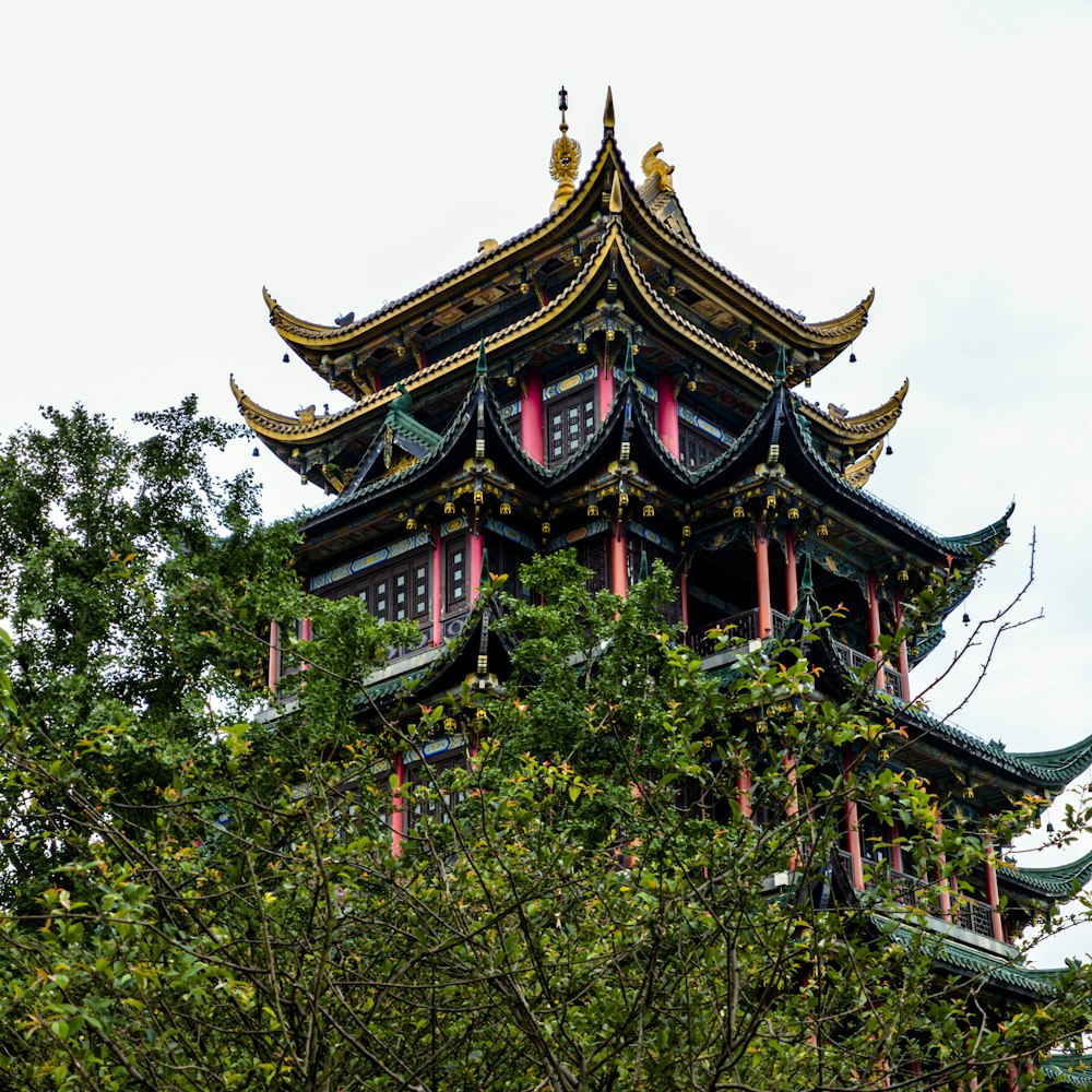 a tall tower with a clock on the top of it