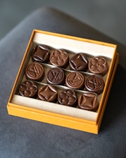 a box of chocolates sitting on top of a table