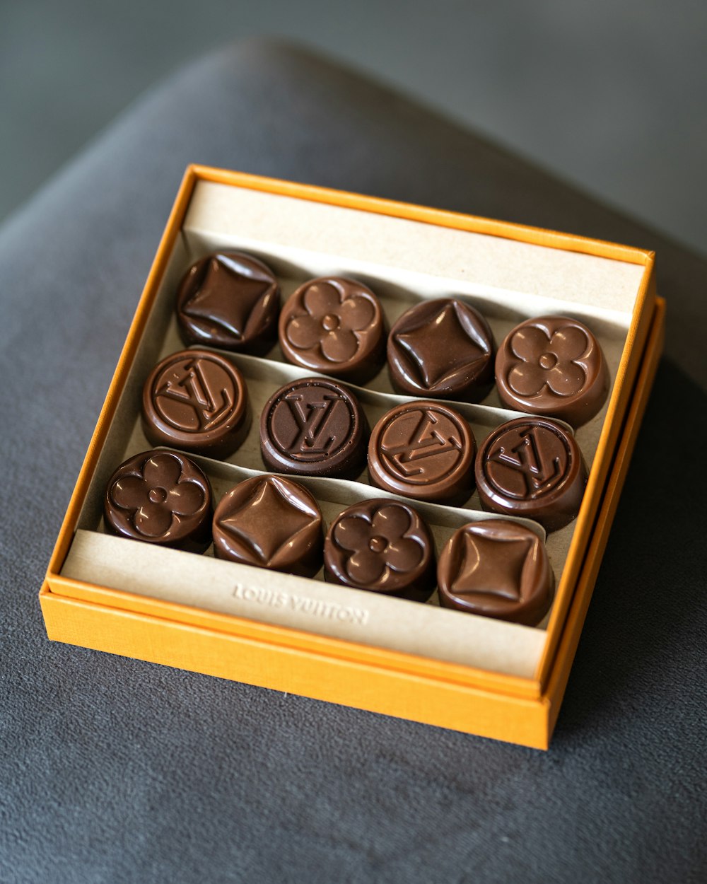 a box of chocolates sitting on top of a table