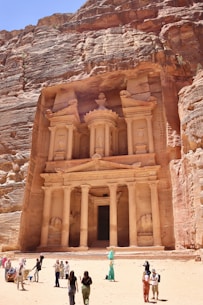 a group of people standing in front of a building