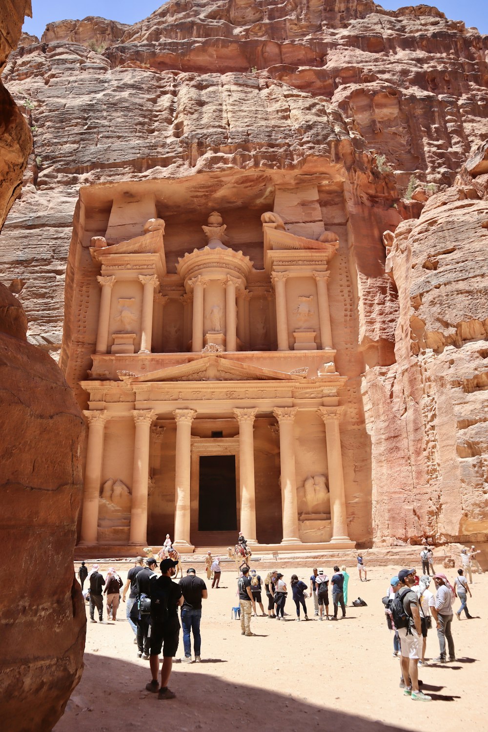 a group of people standing in front of a building