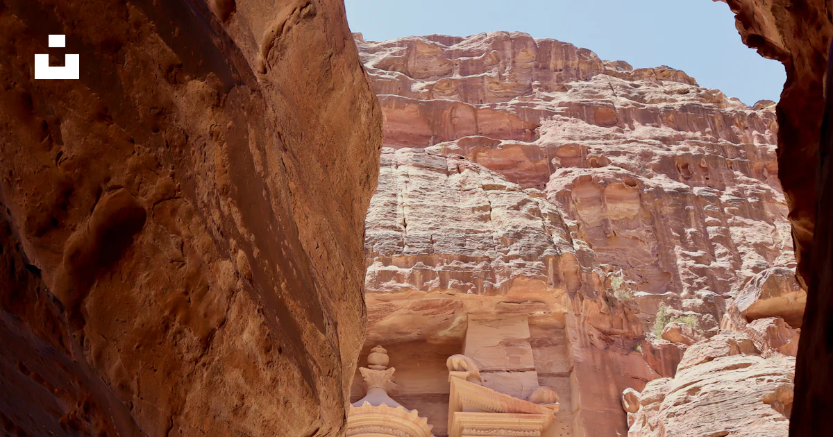 Views Through Rocks A view of a building through some rocks photo – Free Jordan Image on ...