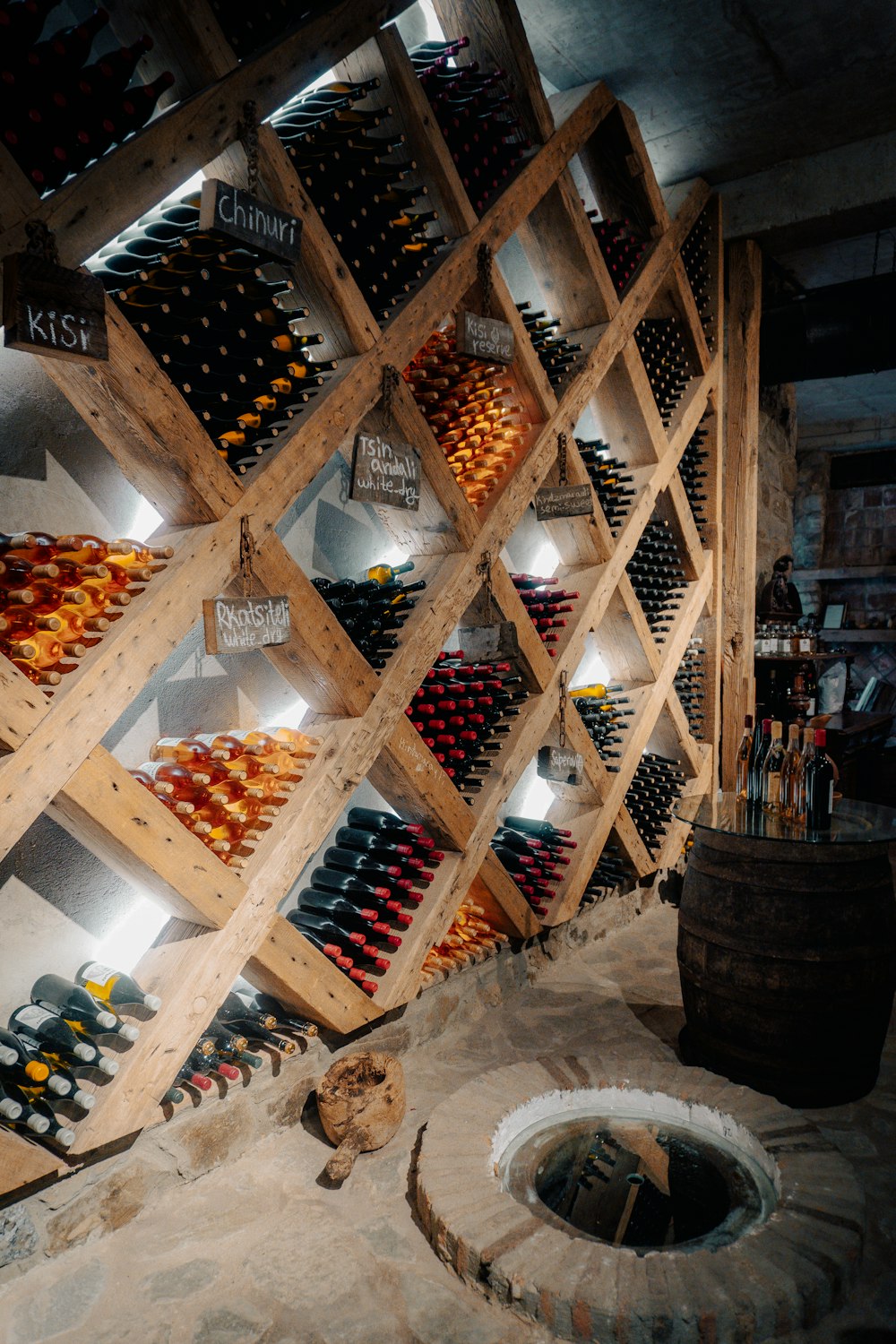 a wine cellar filled with lots of bottles of wine