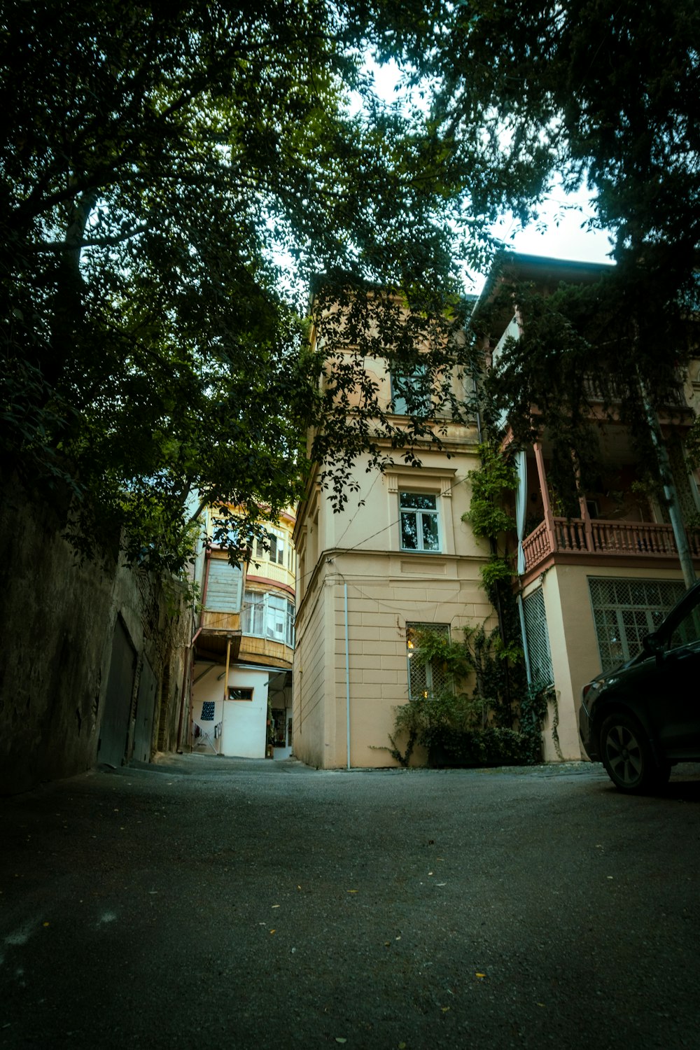 a car is parked in front of a building