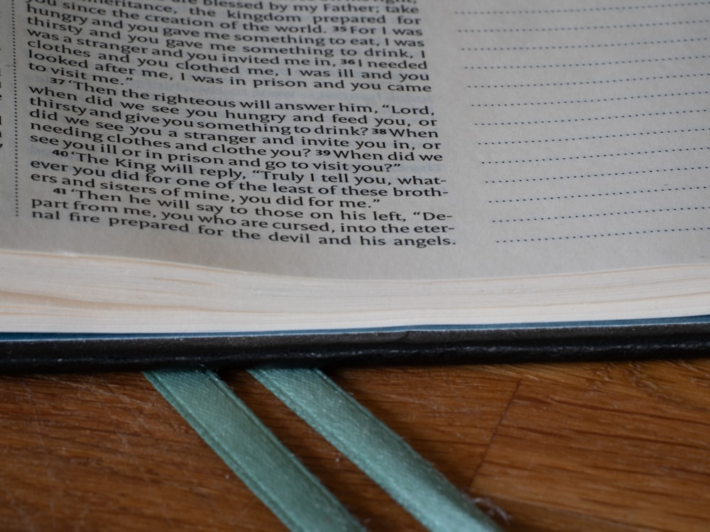 a close up of an open book on a table