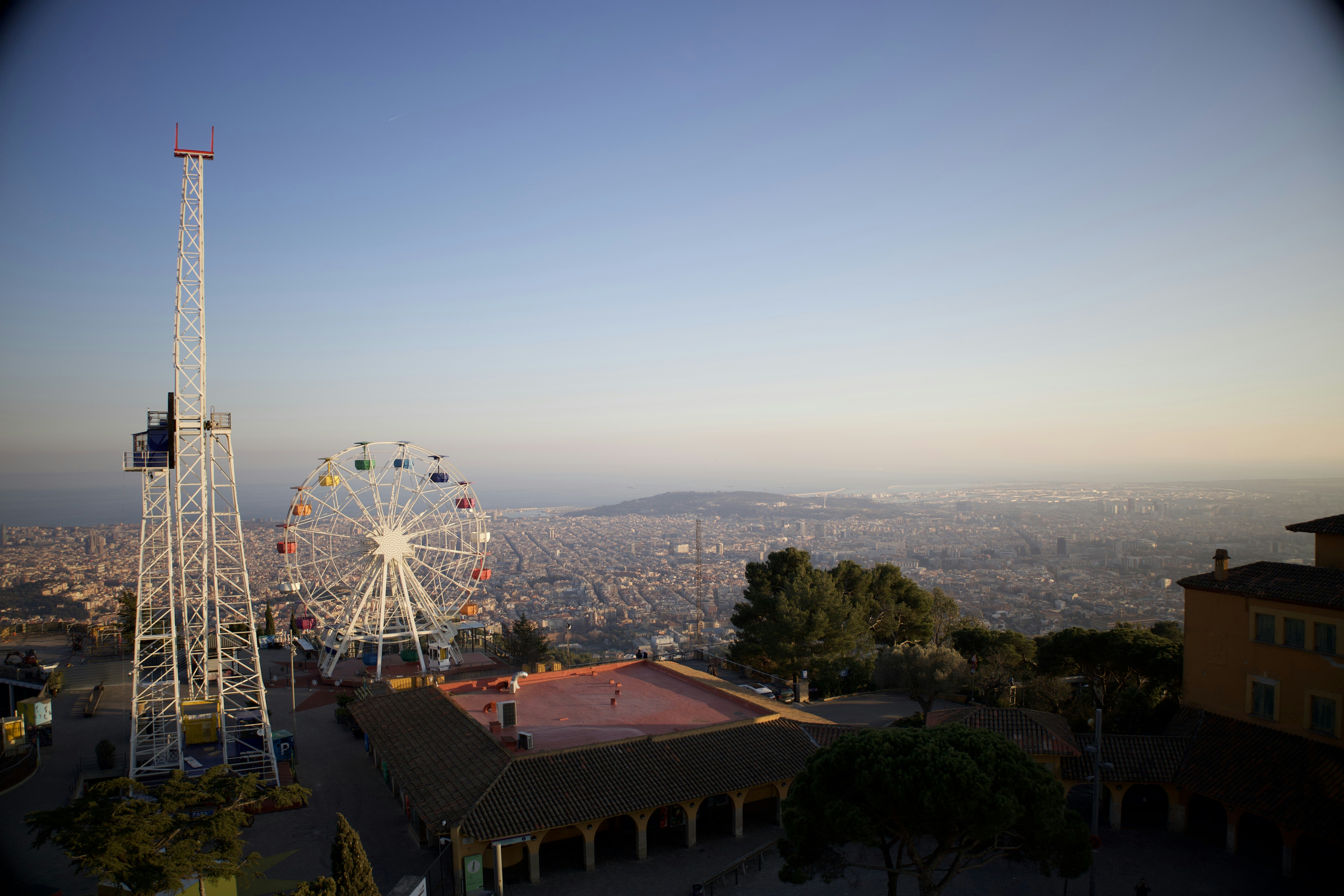 a ferris wheel in the middle of a city