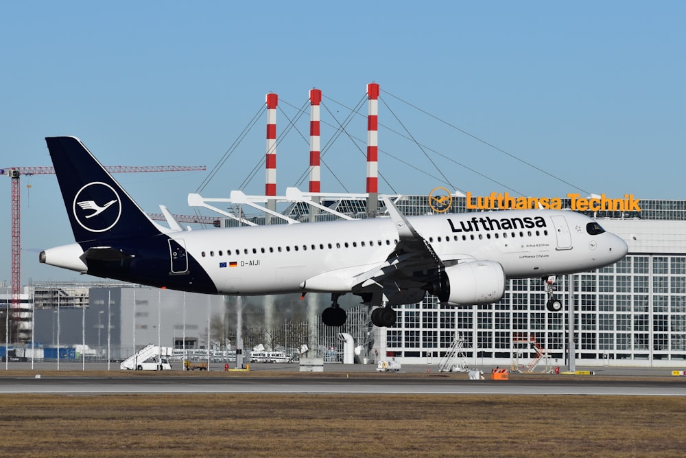 a large jetliner taking off from an airport runway