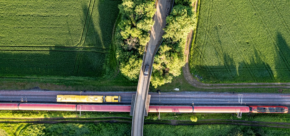 an aerial view of a train on the tracks