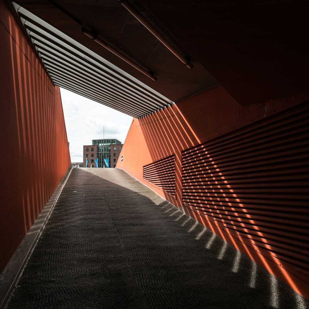 a view of a walkway with a building in the background