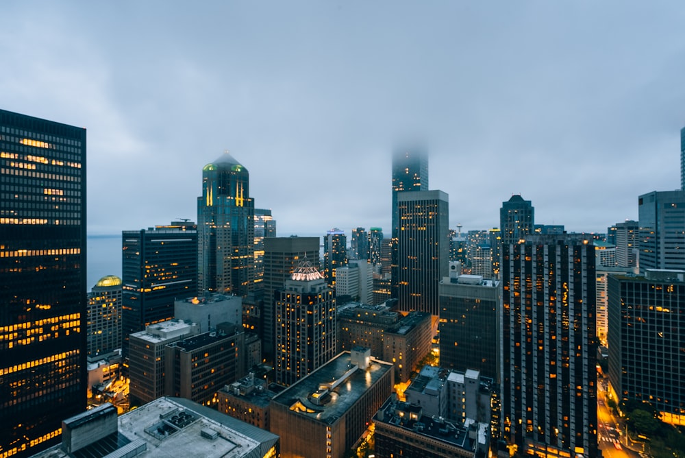 a view of a city at night from the top of a building