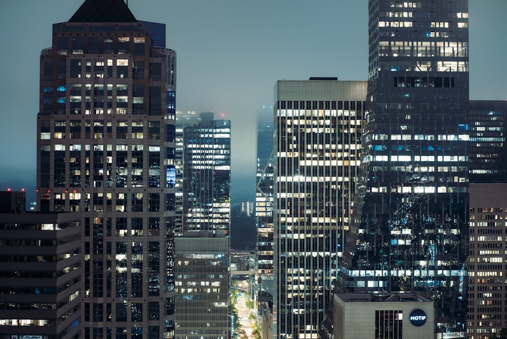 a view of a city at night from the top of a building