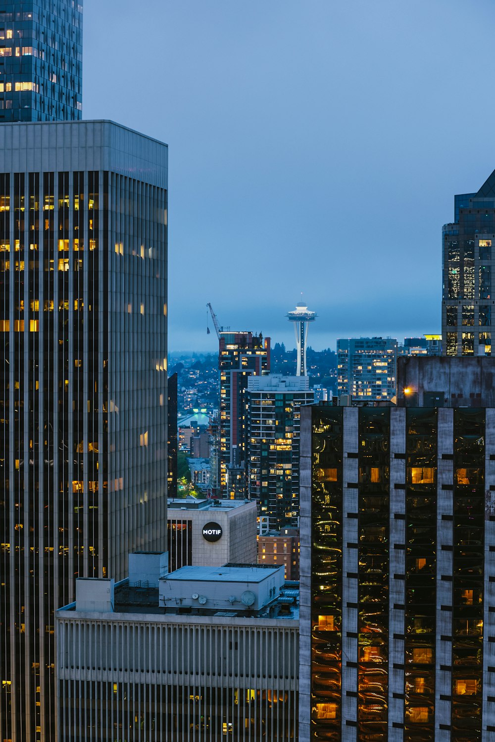 a view of a city at night from the top of a building