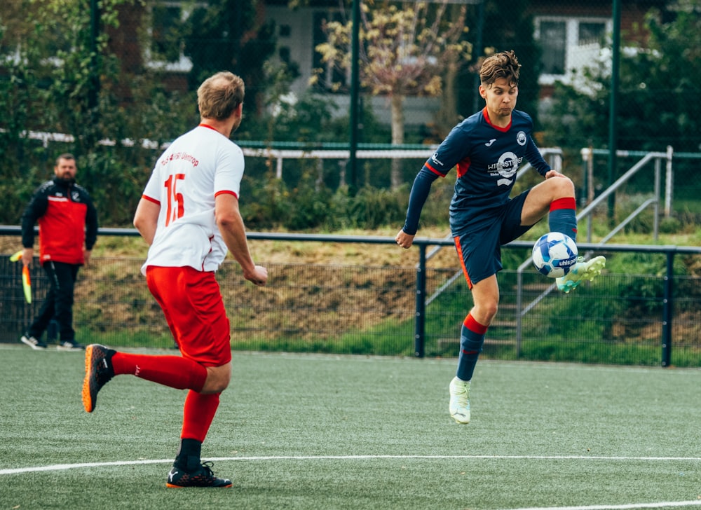 a group of young men playing a game of soccer