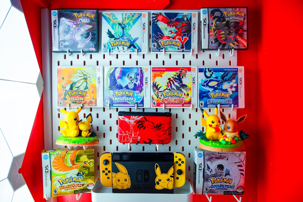 a display of pokemon trading cards and figurines