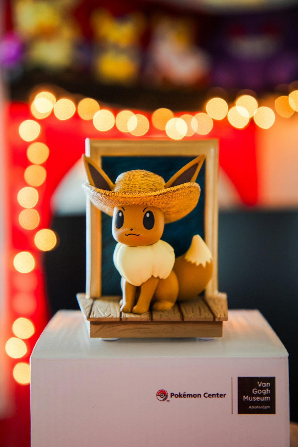 a toy sitting on top of a white box